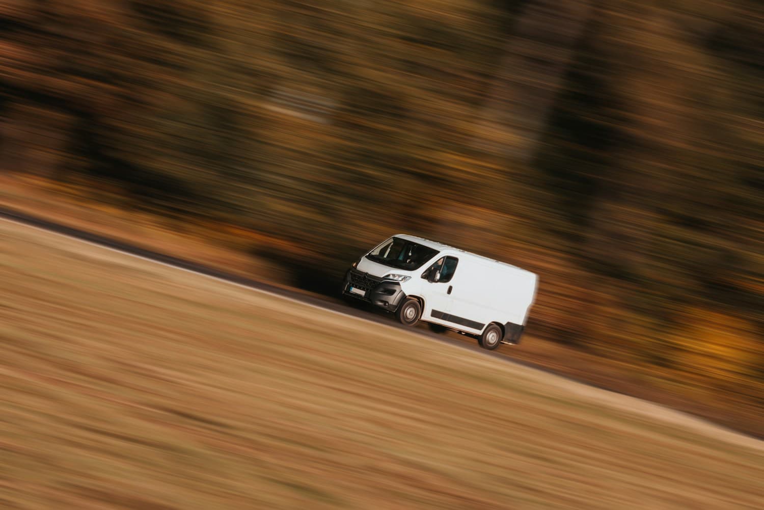 Delivery van and worker representing field service and delivery management